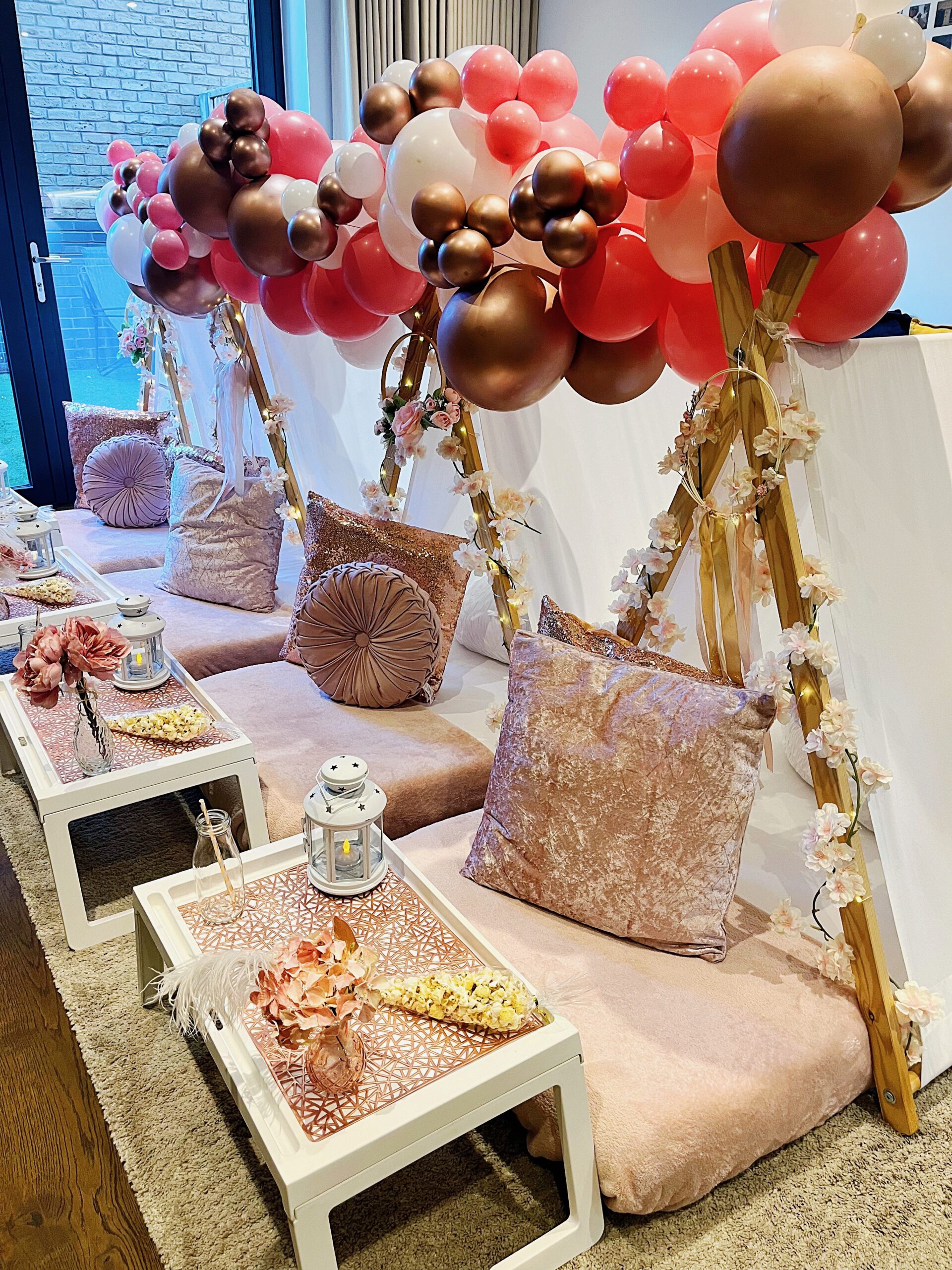 Balloon garland at sleepover party Rose gold balloon garland at Eat Sleep Dream Repeat sleepover party